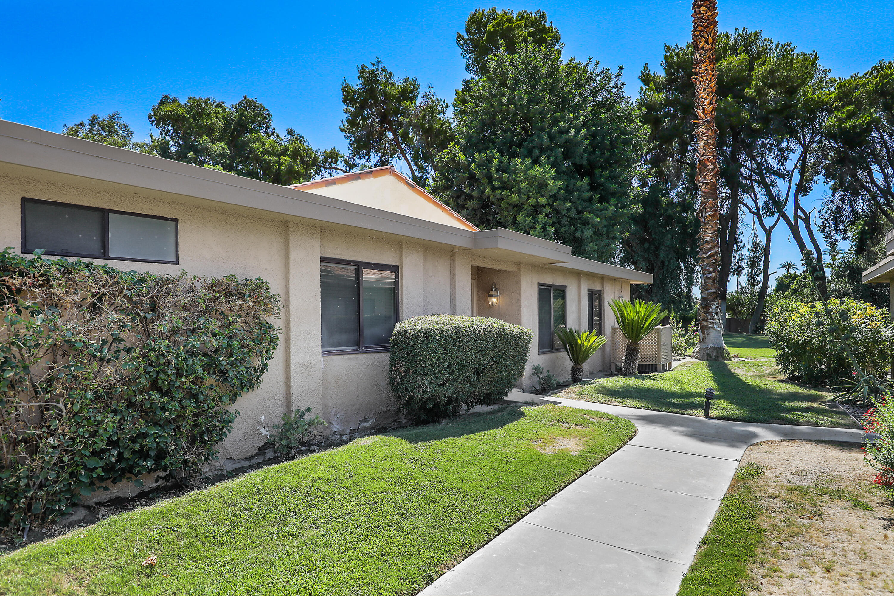 5 Majorca Drive Rancho Mirage, CA 92270 - Photo 18 of 40 a view of a house with a yard and plants