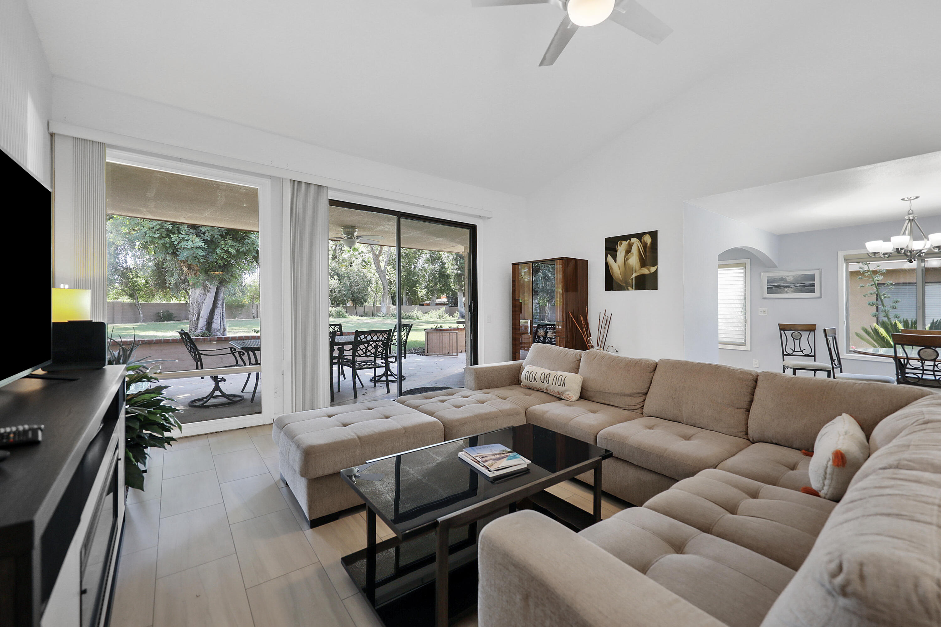5 Majorca Drive Rancho Mirage, CA 92270 - Photo 2 of 40 a living room with furniture and a flat screen tv
