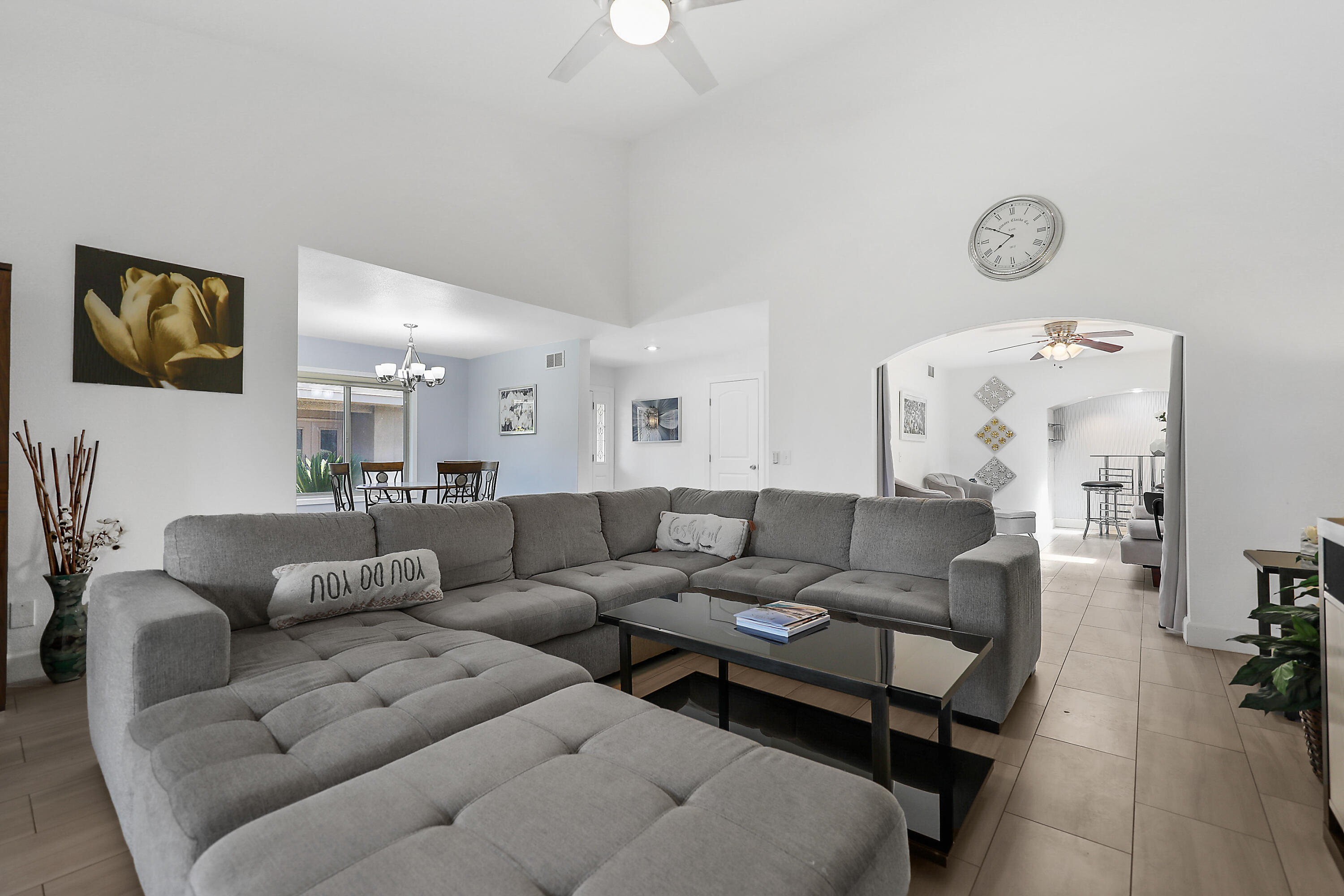 5 Majorca Drive Rancho Mirage, CA 92270 - Photo 4 of 40 a living room with furniture and a floor to ceiling window