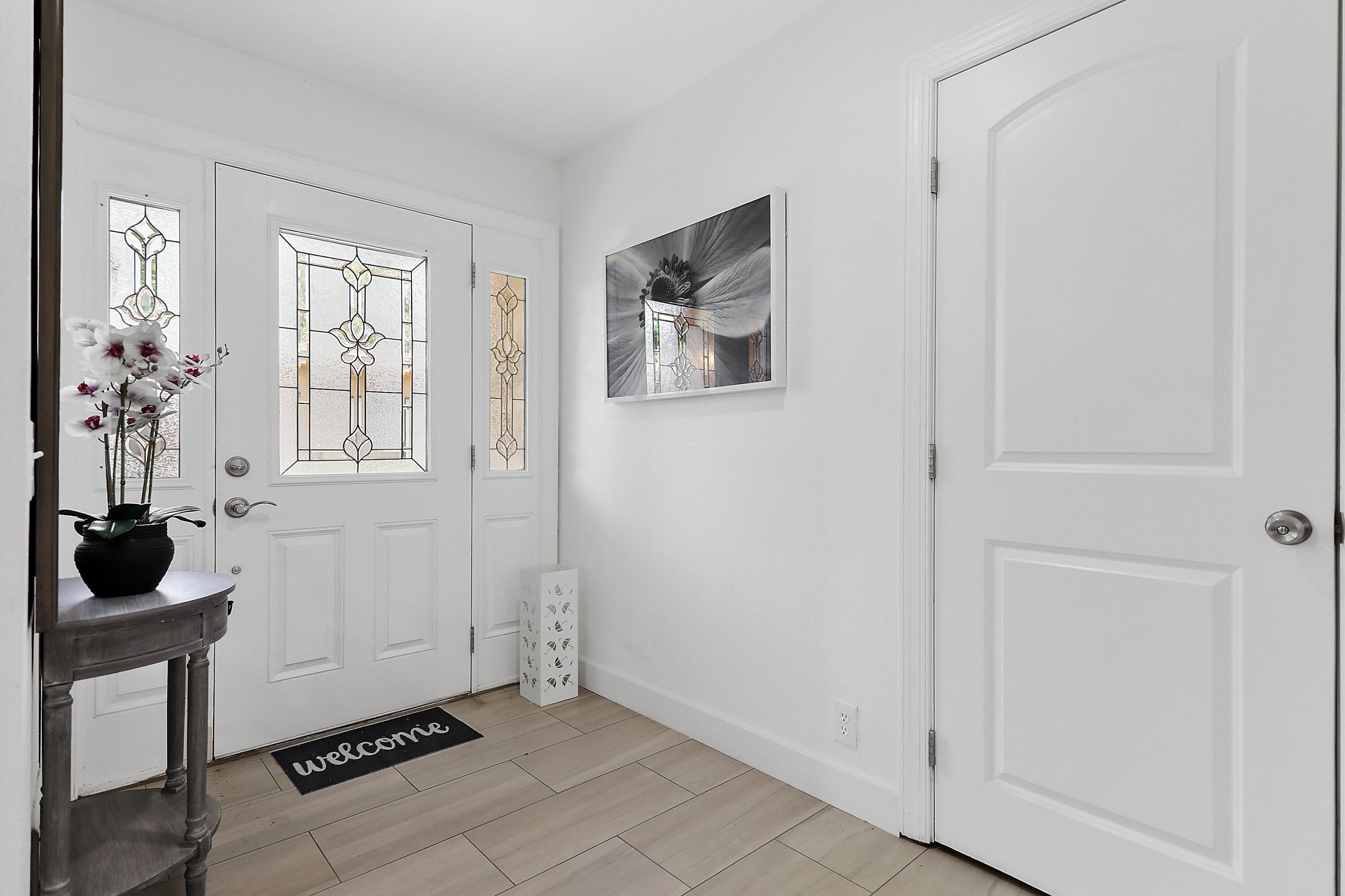 5 Majorca Drive Rancho Mirage, CA 92270 - Photo 5 of 40 a view of an entryway with wooden floor