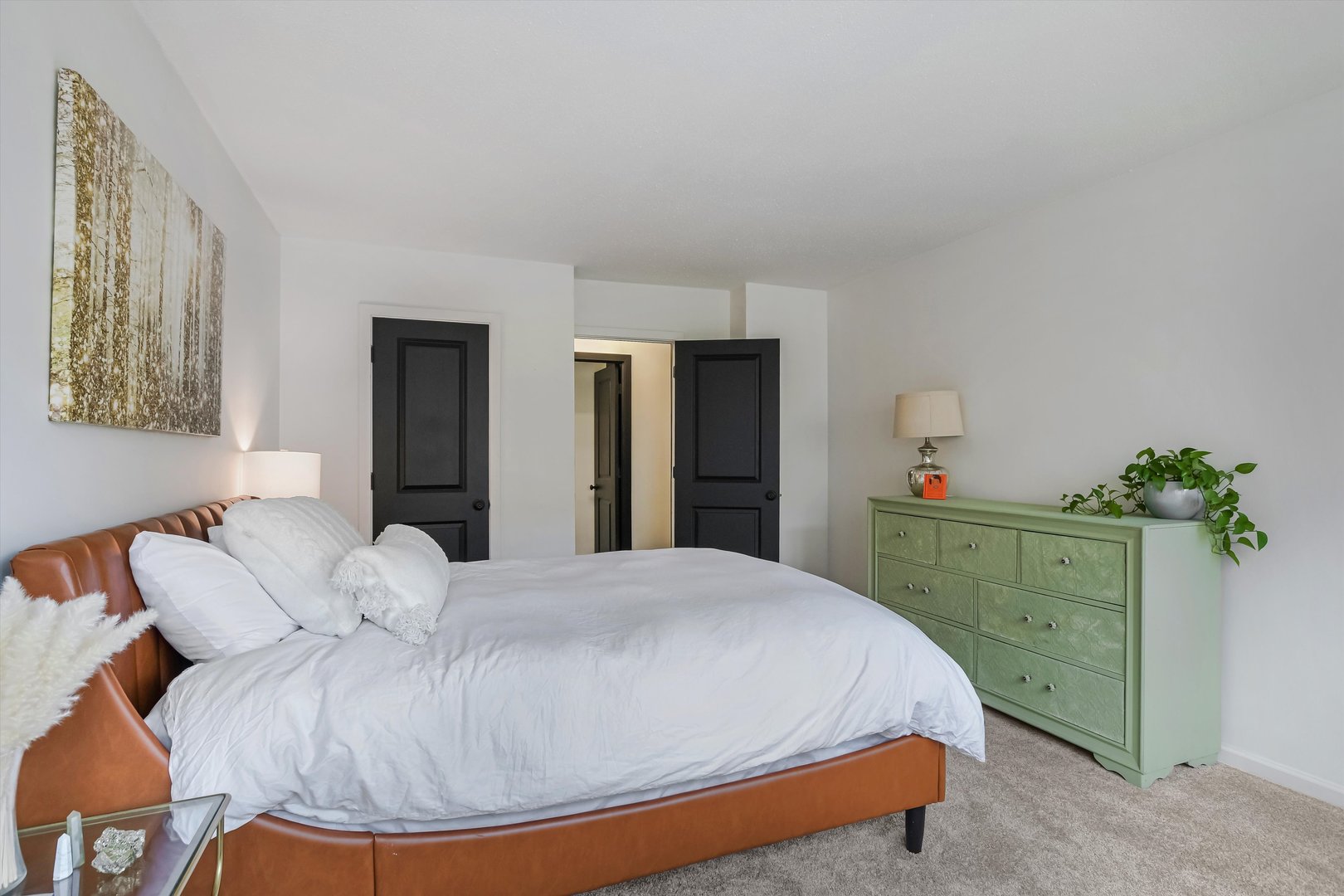 2930 North Sheridan Road, Unit 1111 Chicago, IL 60657 - Photo 12 of 28 a bedroom with a bed and a dresser