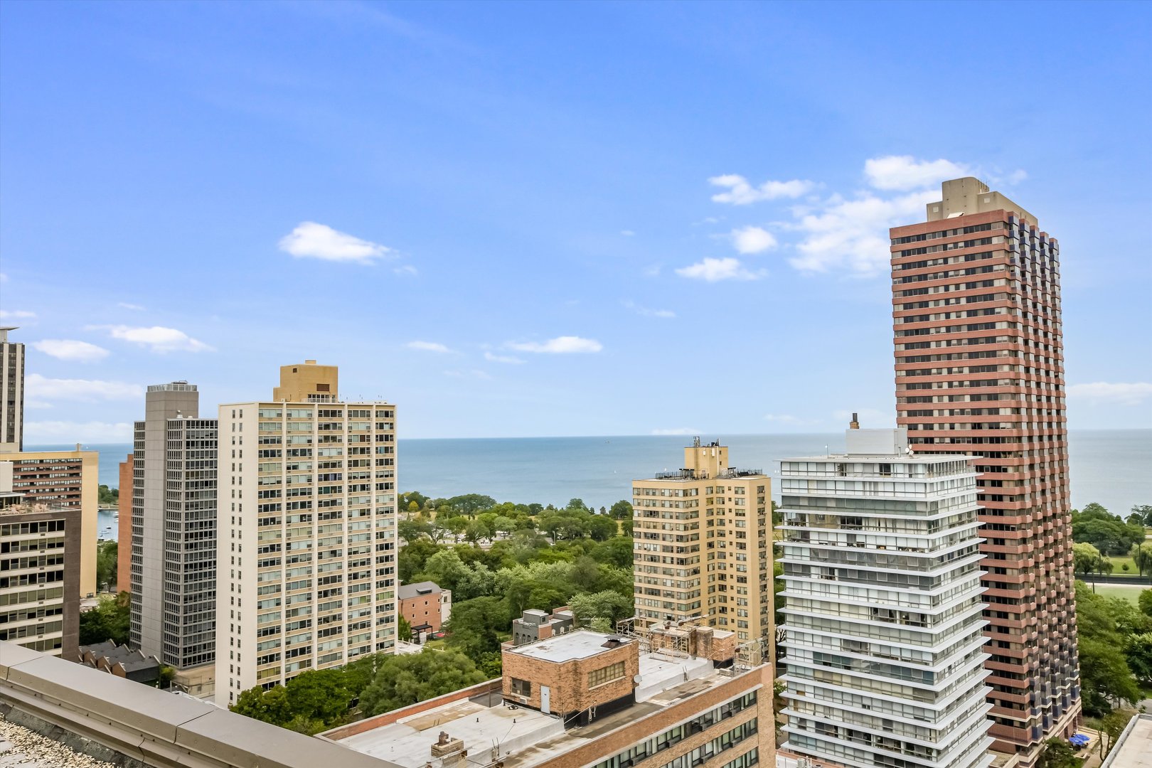 2930 North Sheridan Road, Unit 1111 Chicago, IL 60657 - Photo 22 of 28 a view of a city with tall buildings