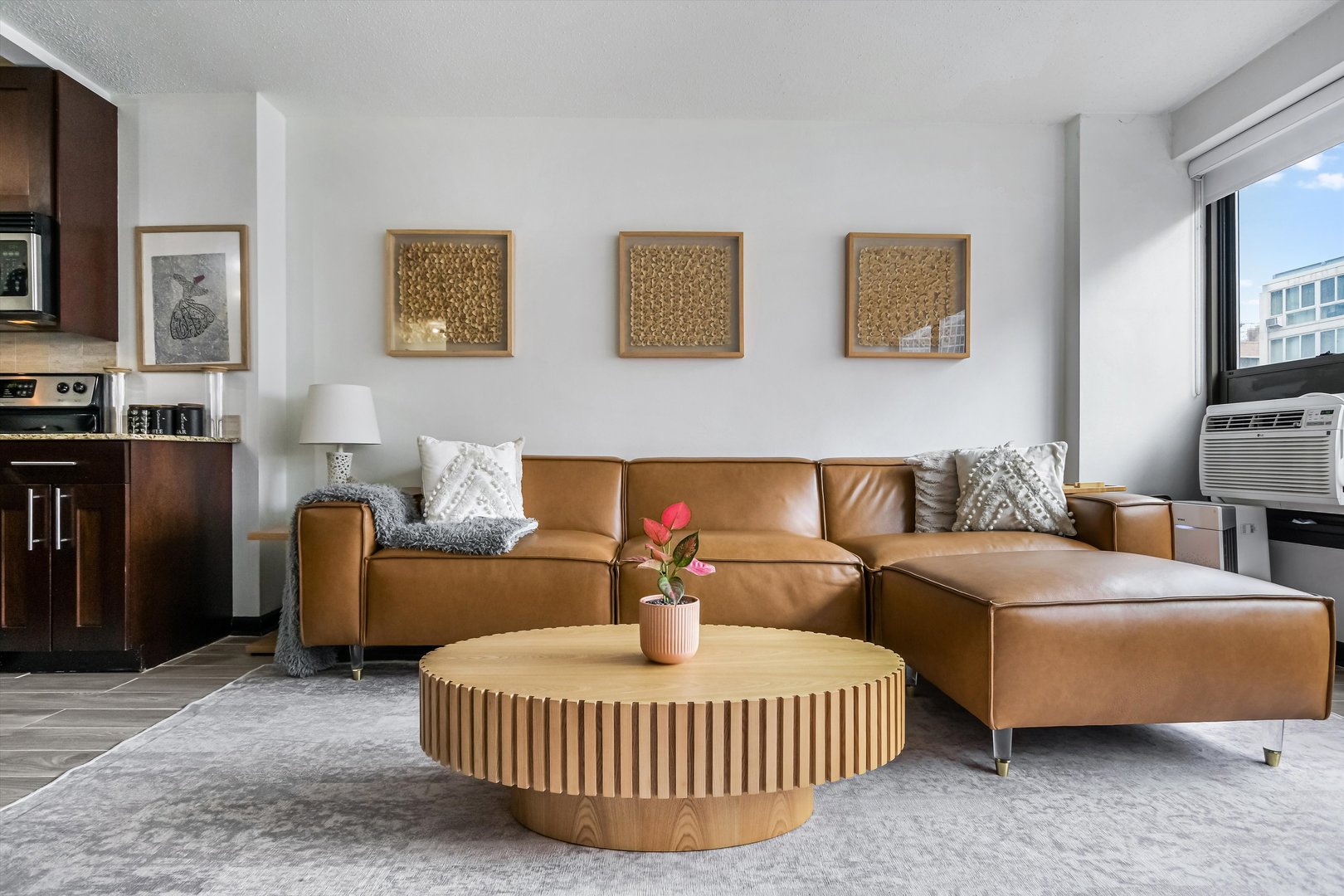 2930 North Sheridan Road, Unit 1111 Chicago, IL 60657 - Photo 7 of 28 a living room with furniture and a fireplace