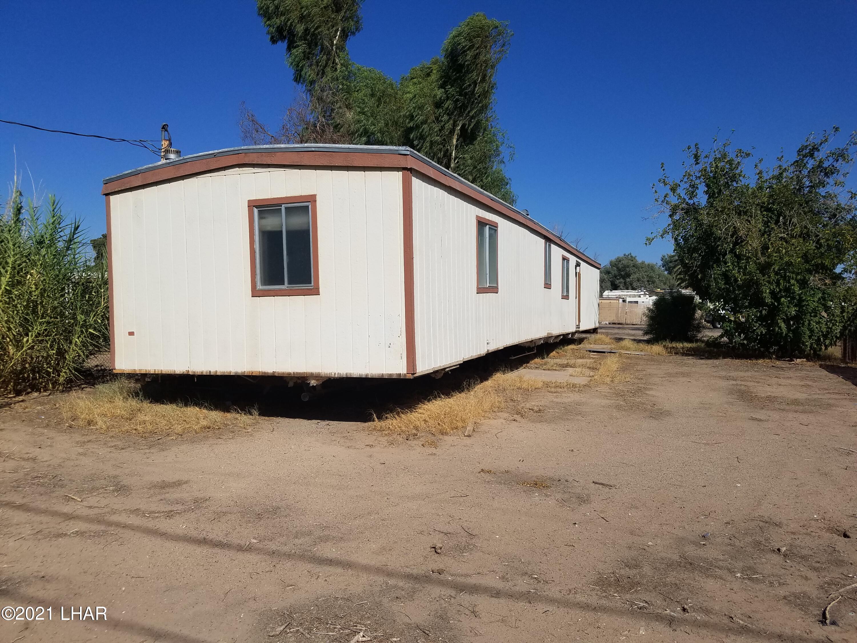 10573-579 Mint Road Mohave Valley, AZ 86440 - Photo 3 of 11 Rear view of 10573 Mint Rd.