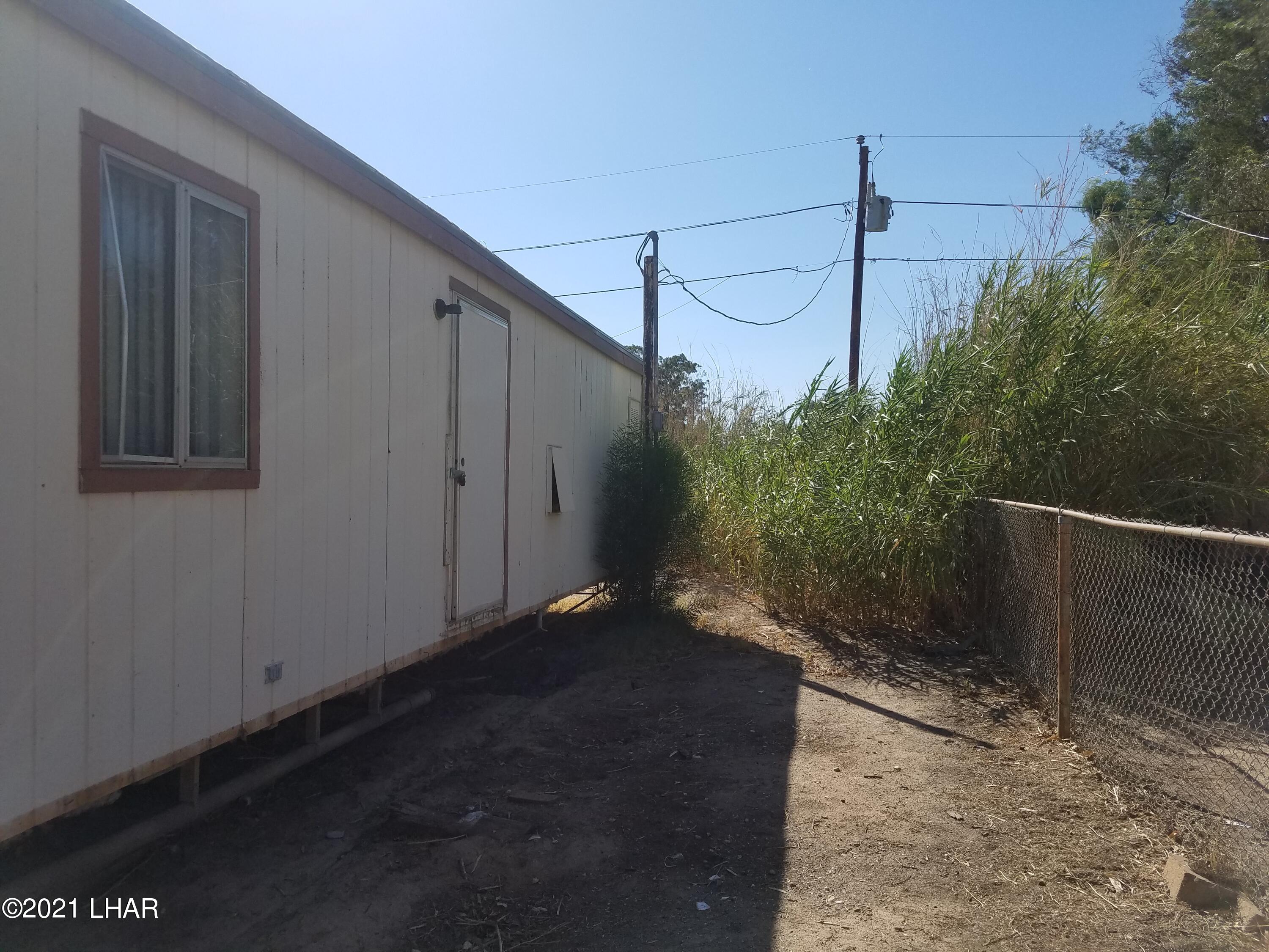 10573-579 Mint Road Mohave Valley, AZ 86440 - Photo 5 of 11 Right Side.
