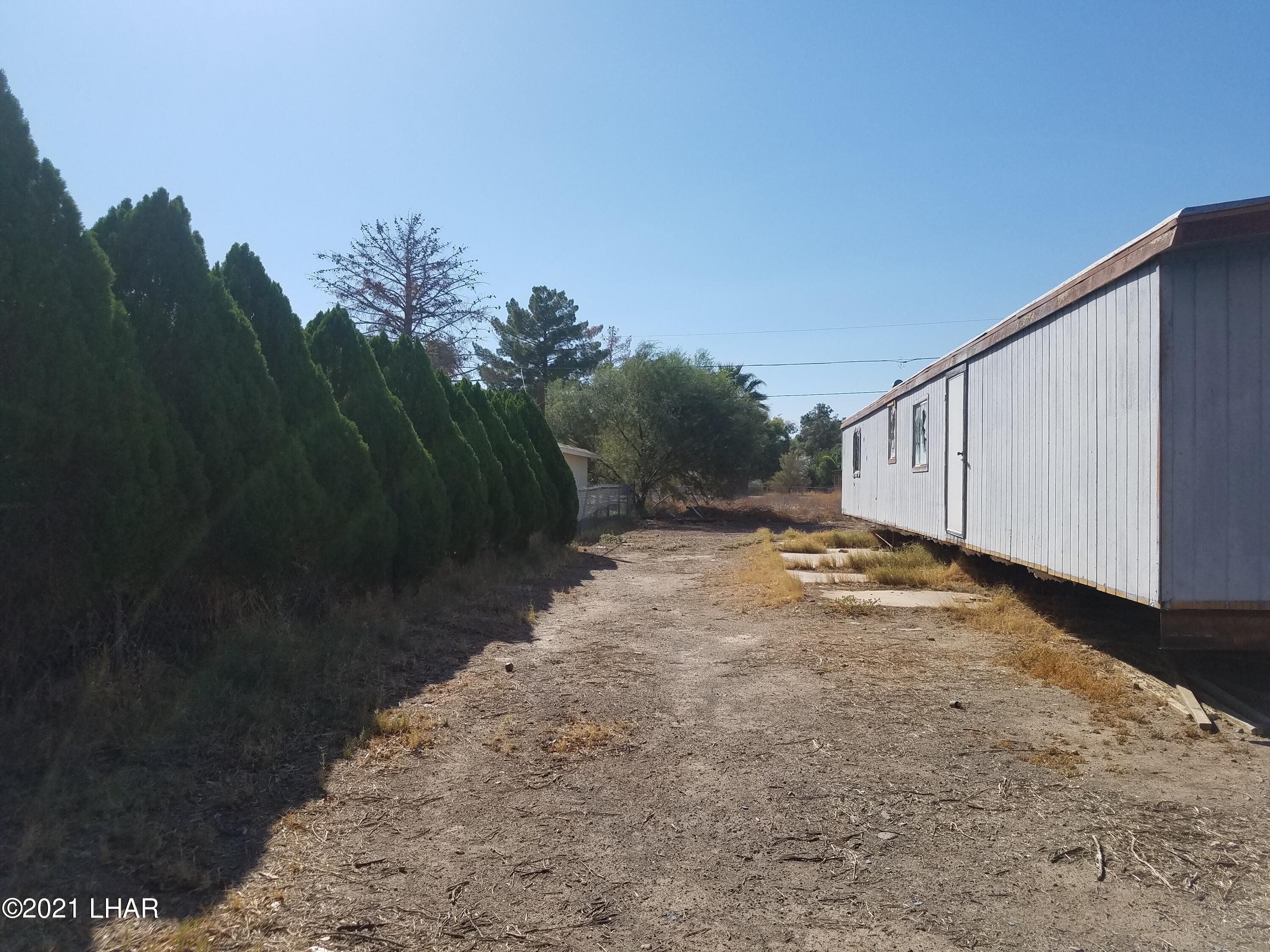 10573-579 Mint Road Mohave Valley, AZ 86440 - Photo 6 of 11 Left Side.