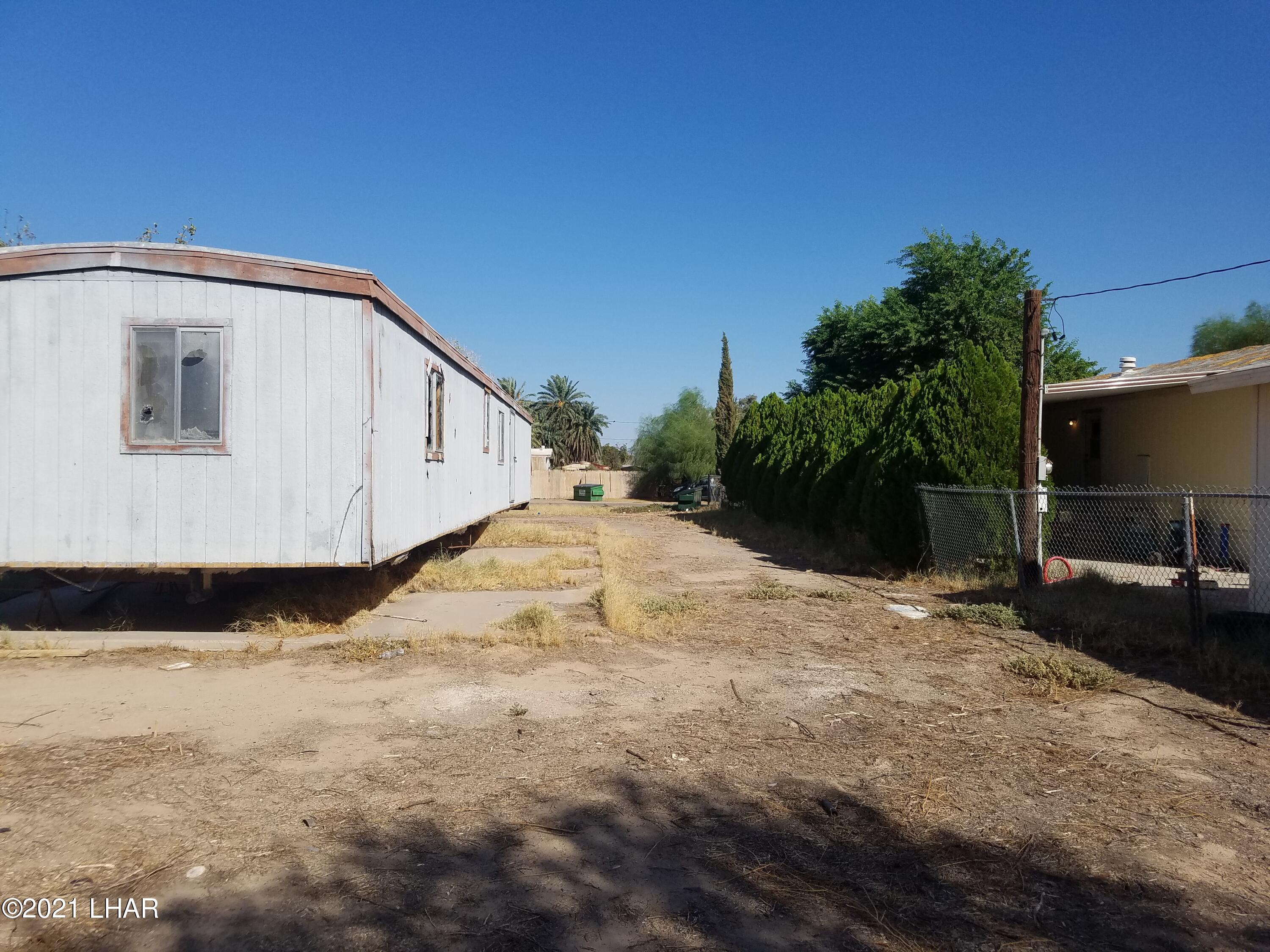 10573-579 Mint Road Mohave Valley, AZ 86440 - Photo 8 of 11 Another rear view of 10579.