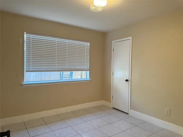a view of an empty room with window