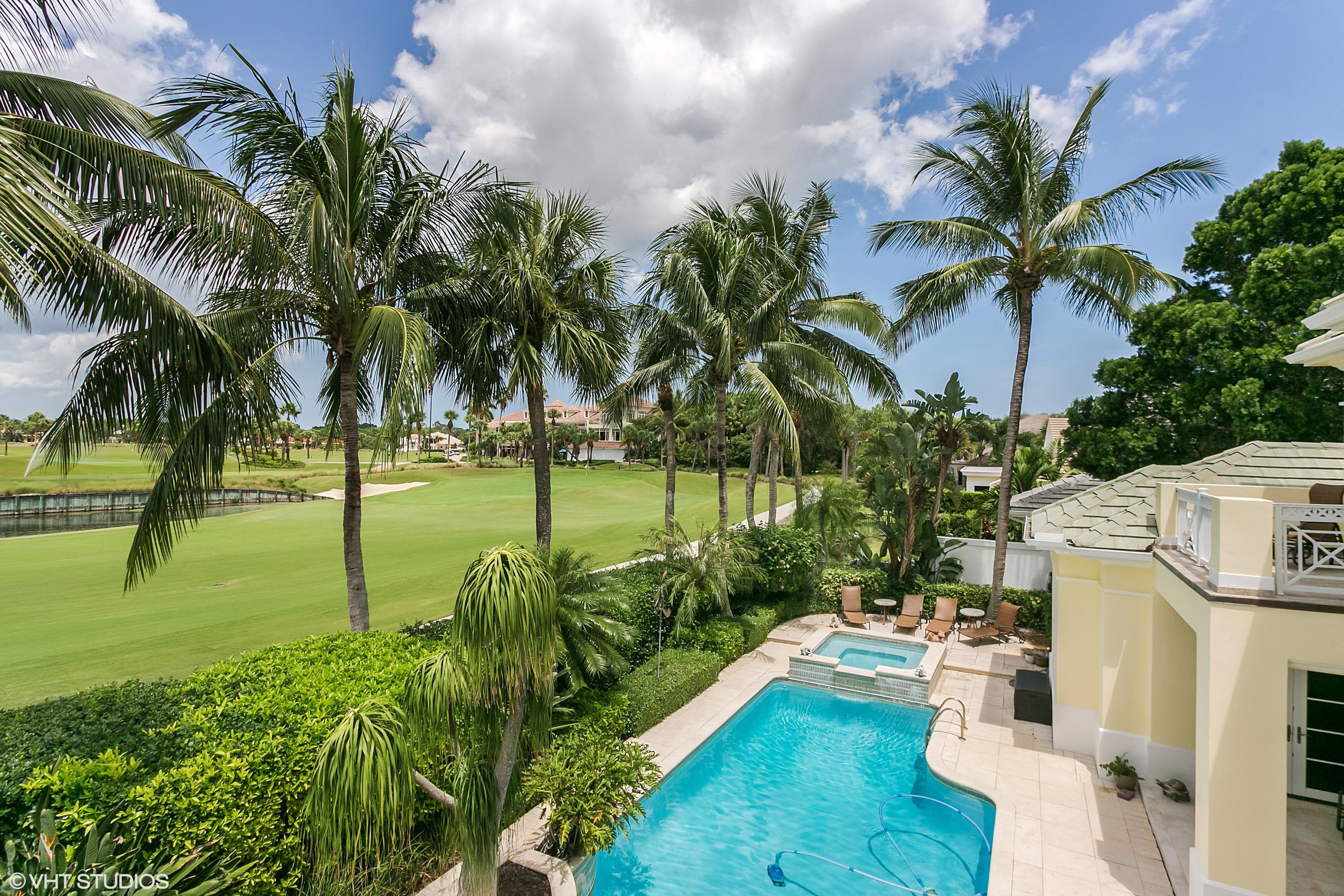 119 Terrapin Trail Jupiter, FL 33458 - Photo 9 of 41 33_119TerratinTer_59_RearView_HiRes