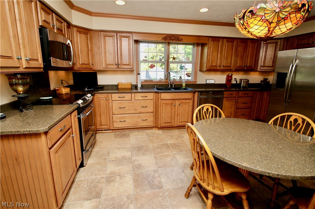 177 Fairfield Road Painesville, OH 44077 - Photo 9 of 16 Granite countertops, stainless steel appliances and porcelain flooring