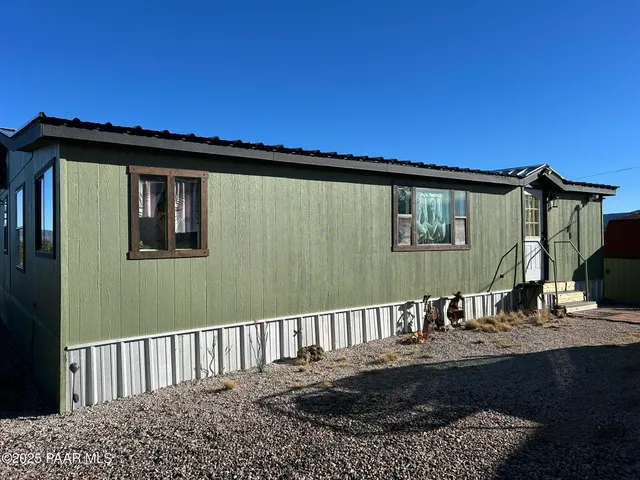 a view of a house with a porch