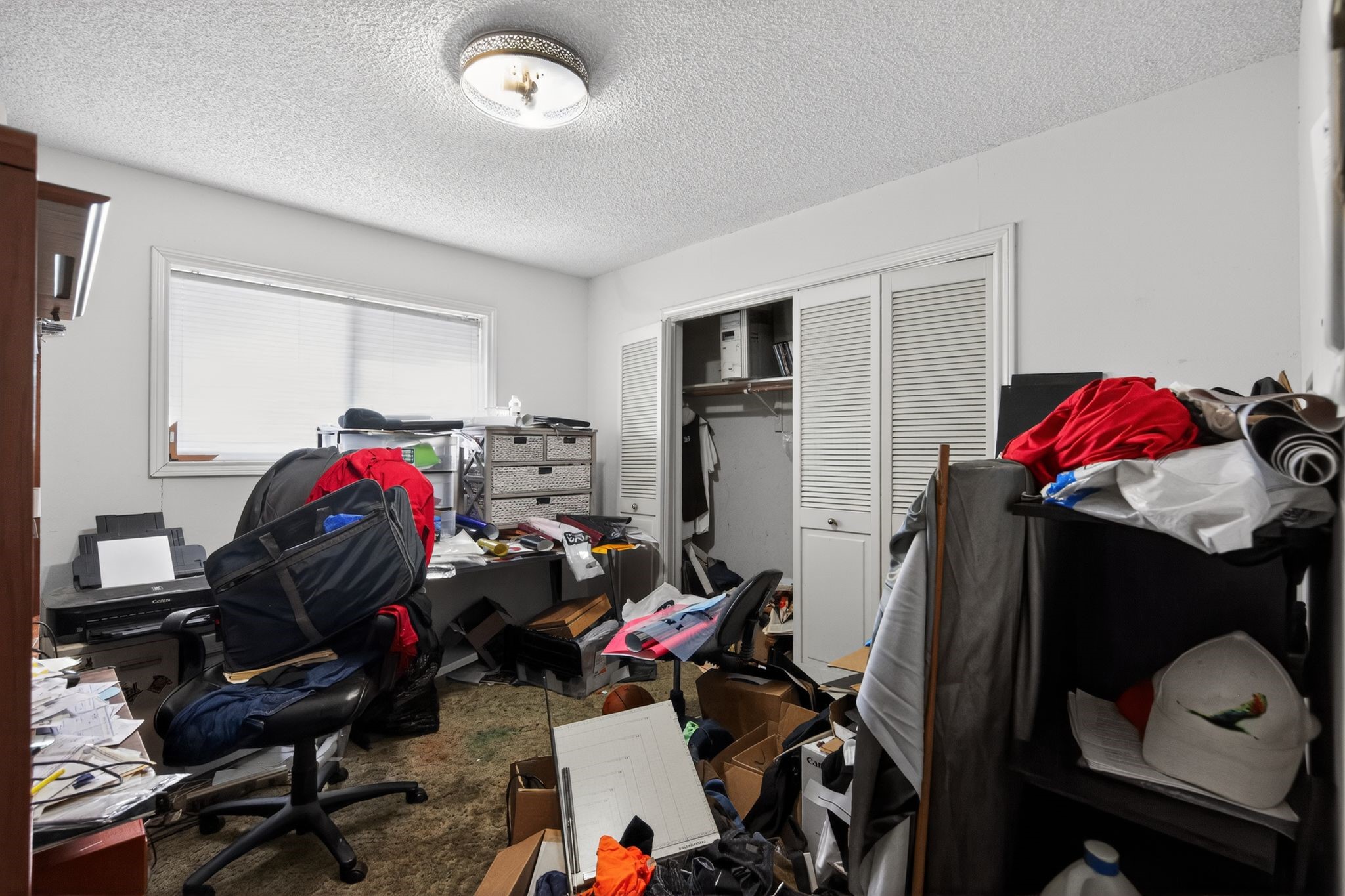 7815 Hummingbird Street Houston, TX 77071 - Photo 18 of 24 a view of a room with gym equipment