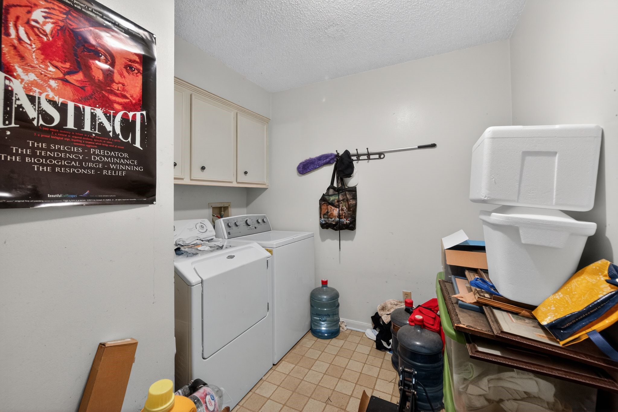 7815 Hummingbird Street Houston, TX 77071 - Photo 20 of 24 a utility room with dryer and washer