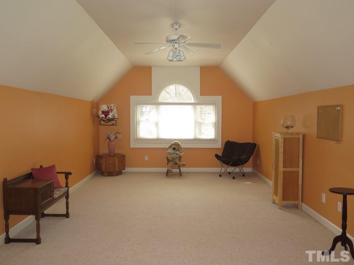 11316 John Allen Road Raleigh, NC 27614 - Photo 15 of 25 a view of a livingroom with a workspace and a window