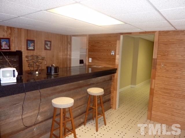 11316 John Allen Road Raleigh, NC 27614 - Photo 17 of 25 a bathroom with a granite countertop sink a mirror and a shower