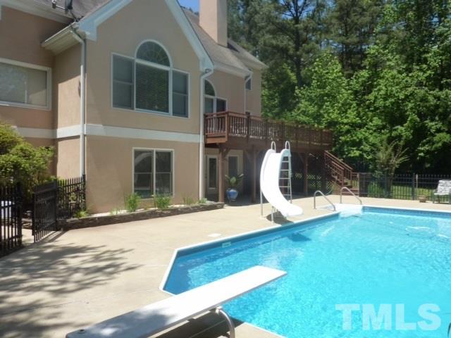 11316 John Allen Road Raleigh, NC 27614 - Photo 21 of 25 a view of a backyard with a garden and entertaining space