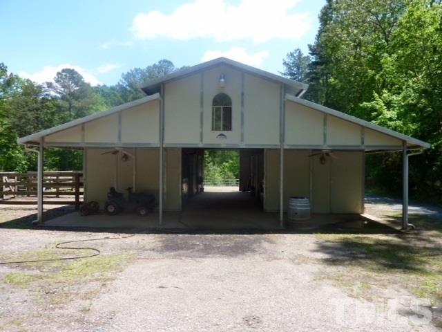 11316 John Allen Road Raleigh, NC 27614 - Photo 24 of 25 a front view of a house with a yard and garage