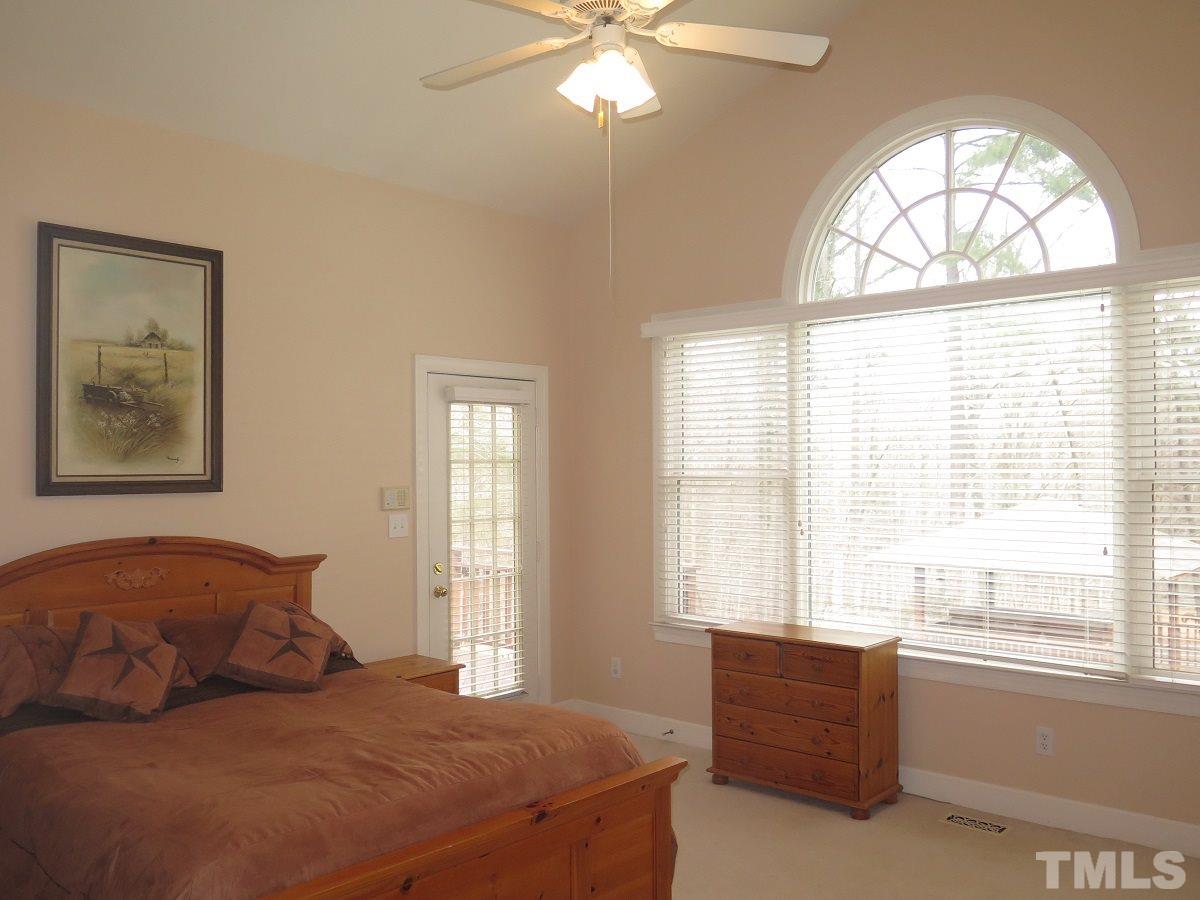 11316 John Allen Road Raleigh, NC 27614 - Photo 8 of 25 a bedroom with a bed and a window