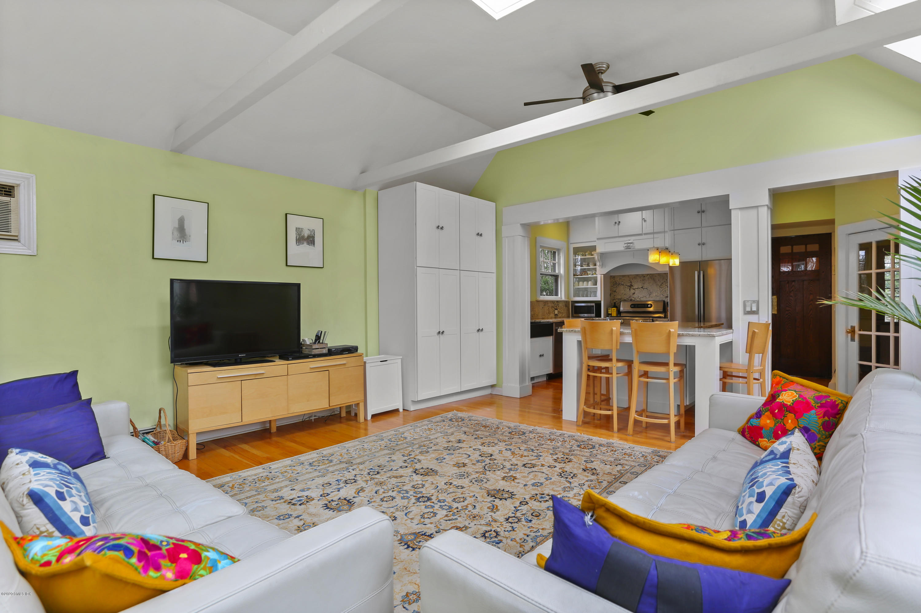 18 Leonard Avenue Riverside, CT 06878 - Photo 13 of 28 a living room with furniture and a flat screen tv