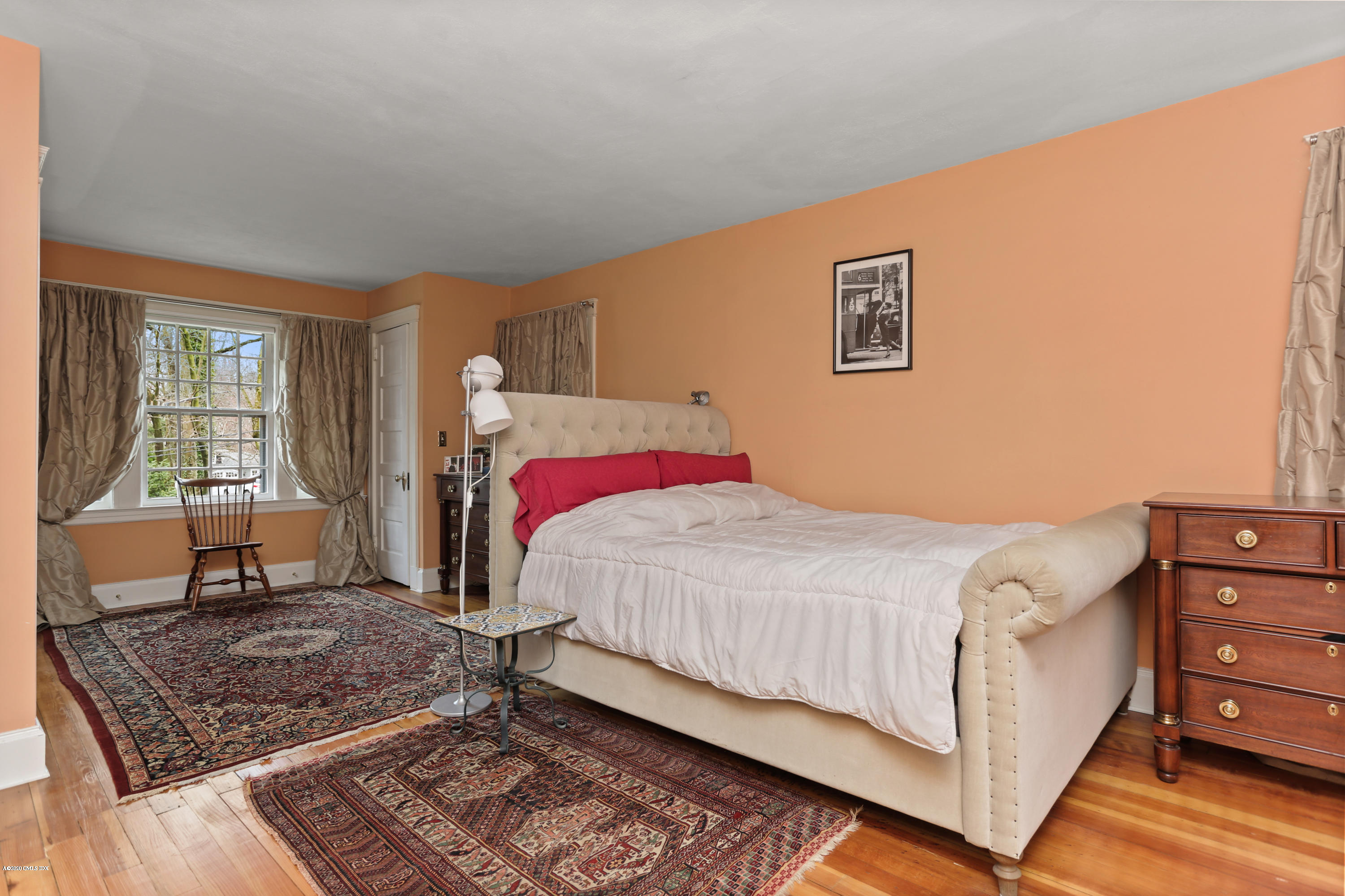 18 Leonard Avenue Riverside, CT 06878 - Photo 18 of 28 a bedroom with a bed and window