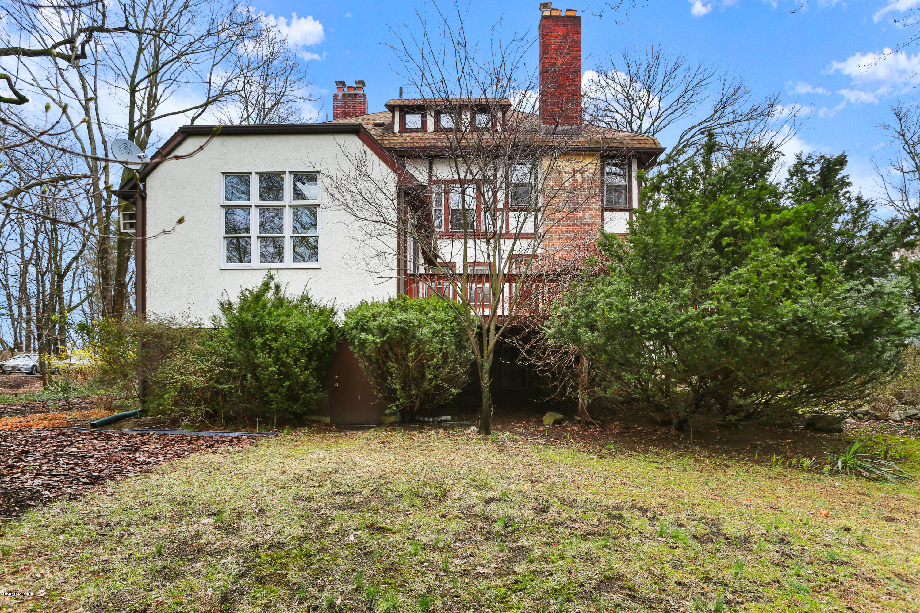 18 Leonard Avenue Riverside, CT 06878 - Photo 26 of 28 a view of a house with a yard