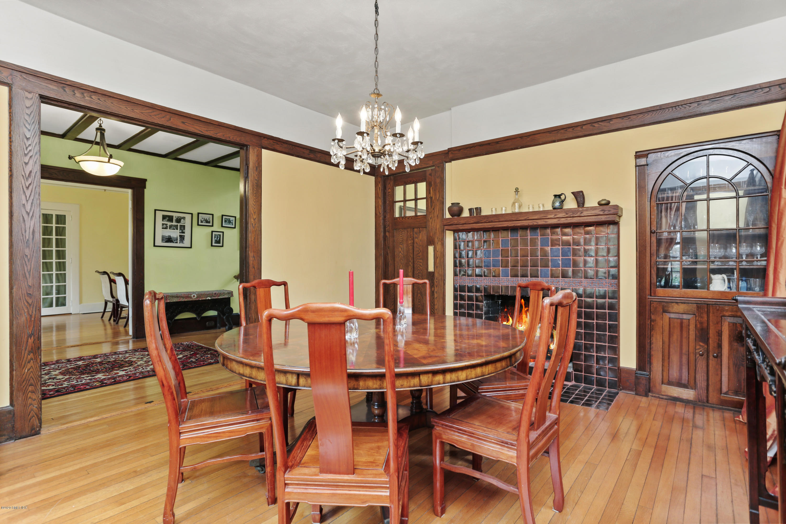 18 Leonard Avenue Riverside, CT 06878 - Photo 3 of 28 a view of a dining room with furniture a chandelier and wooden floor