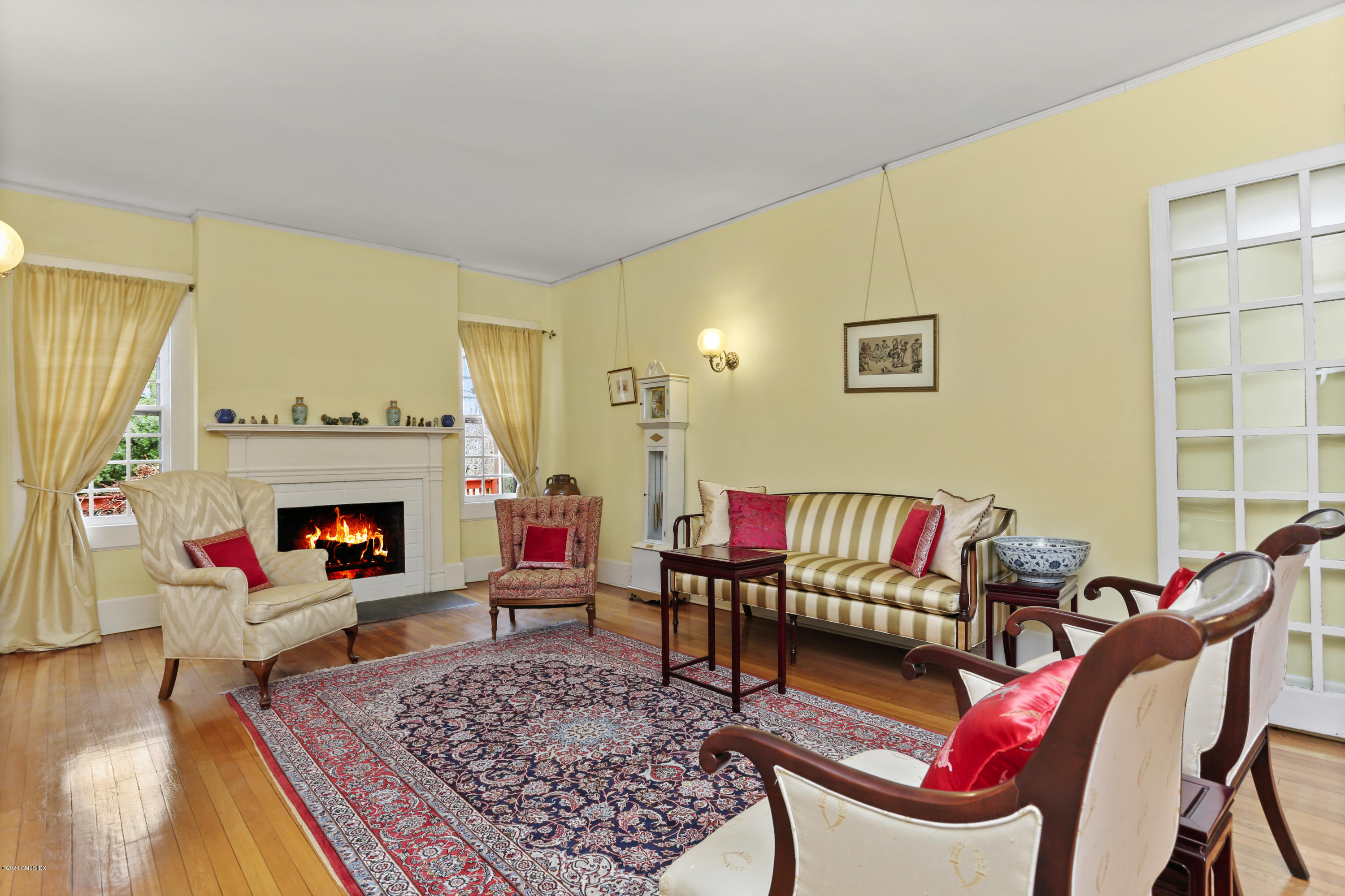 18 Leonard Avenue Riverside, CT 06878 - Photo 5 of 28 a living room with furniture and a fireplace