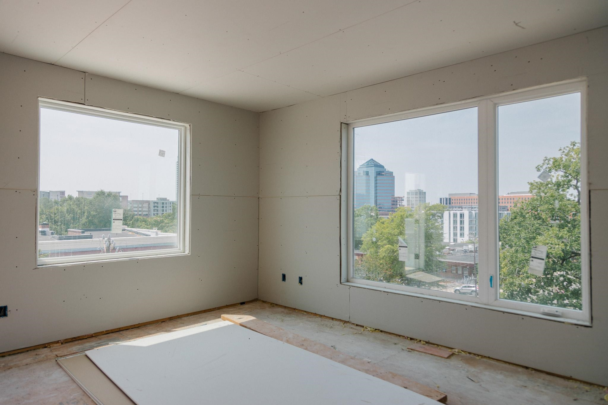 3009 Corbell Durham, NC 27701 - Photo 6 of 28 a view of an empty room with a window