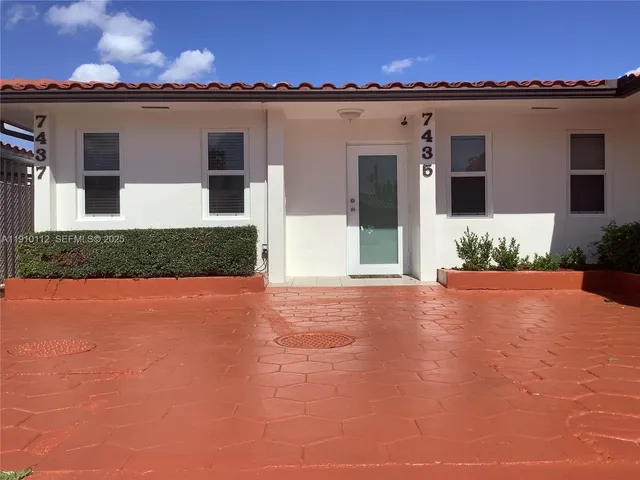 a view of a house with a patio