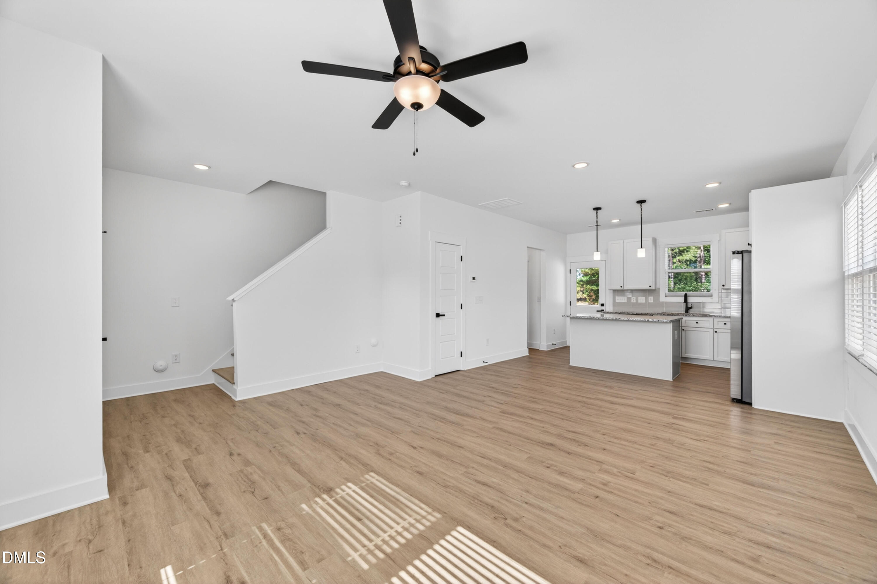 1196 Hurdle Mills Road Roxboro, NC 27573 - Photo 15 of 50 a view of an empty room with a kitchen