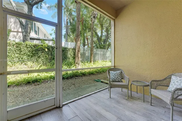 a living room with couch and a window