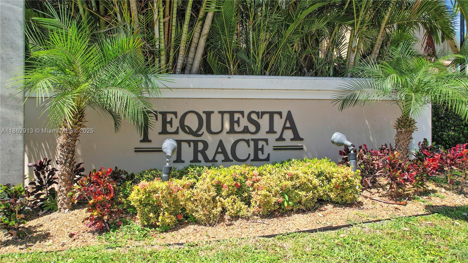 108 Lighthouse Circle, Unit E Tequesta, FL 33469 - Photo 26 of 34 a view of sign board with potted plants