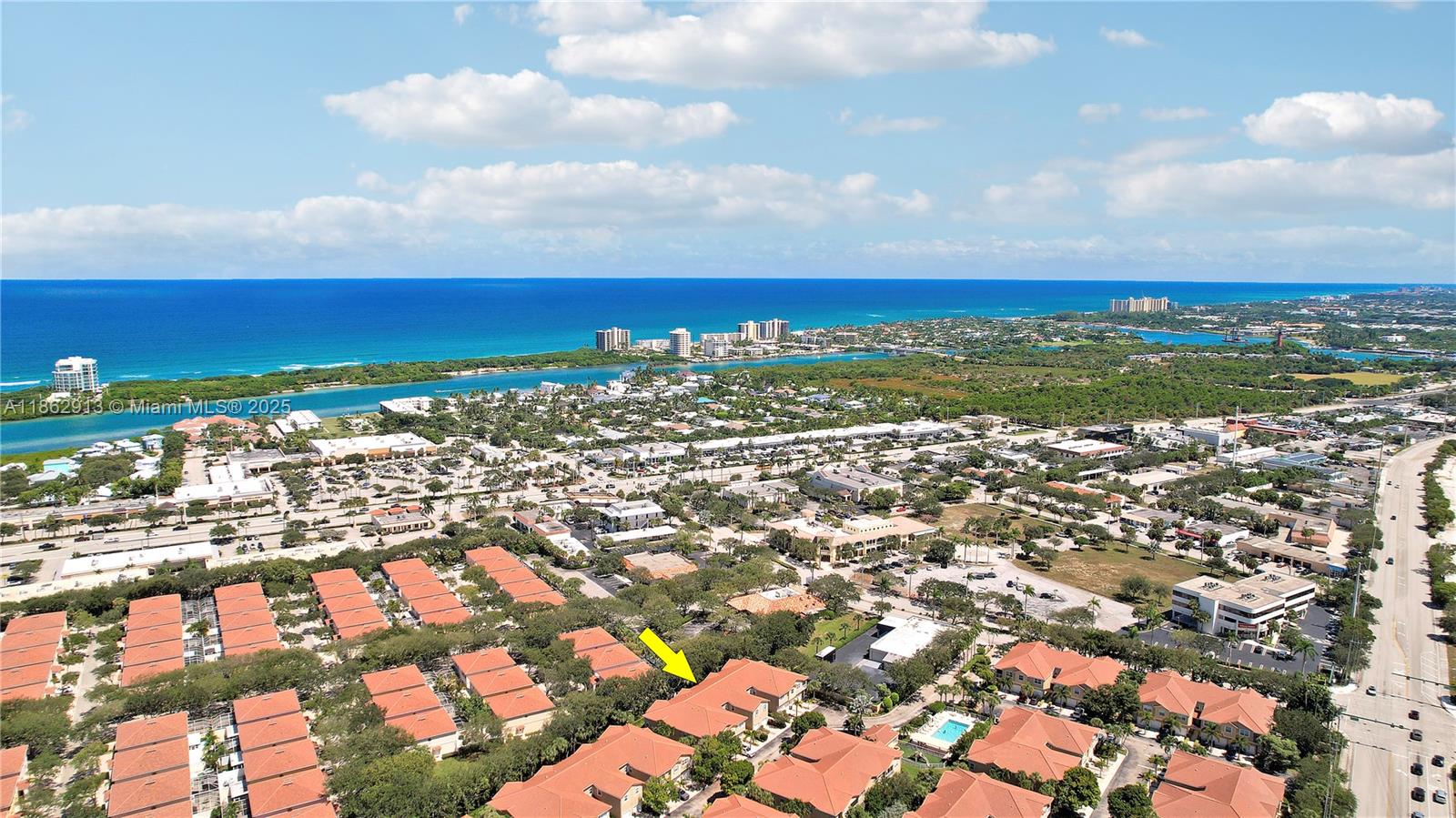 108 Lighthouse Circle, Unit E Tequesta, FL 33469 - Photo 33 of 34 a view of a city with an ocean