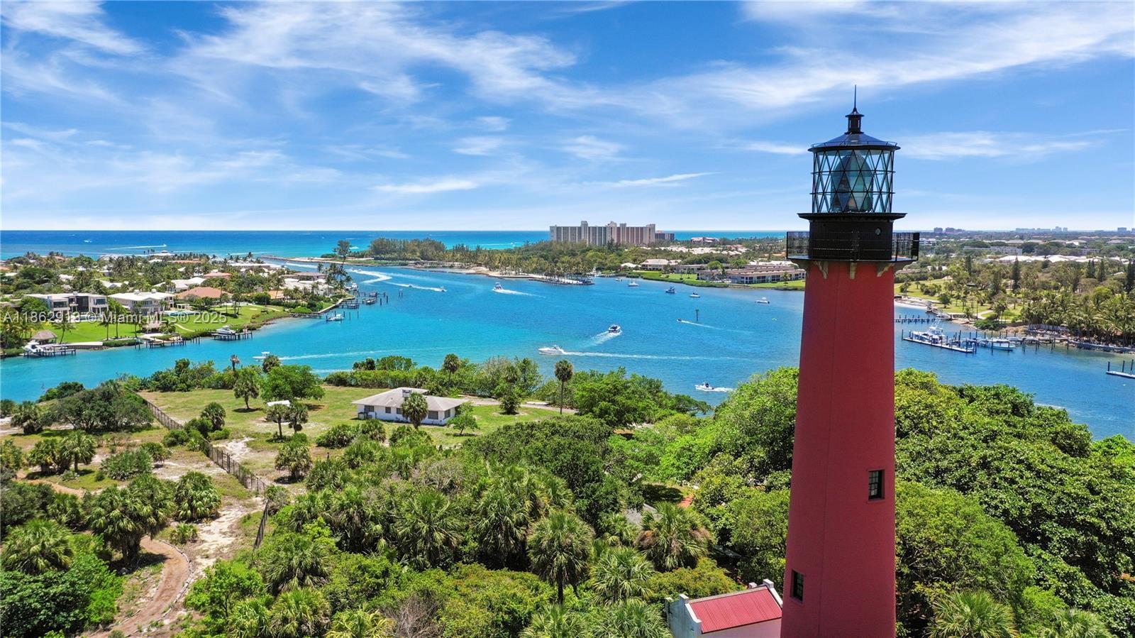 108 Lighthouse Circle, Unit E Tequesta, FL 33469 - Photo 34 of 34 a view of a city with ocean view