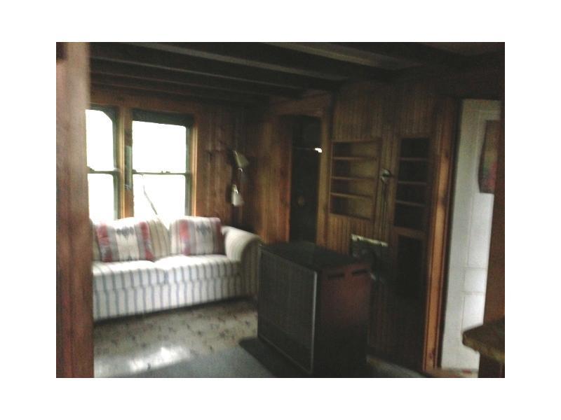 83 Hot Brook Lake Road Danforth, ME 04424 - Photo 3 of 12 Living Room.