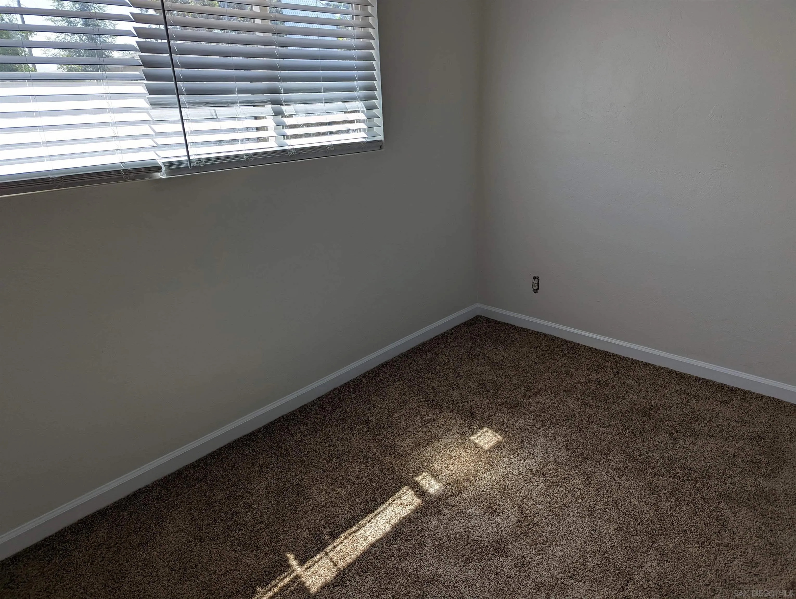 1207-9 Lyons Lane El Cajon, CA 92021 - Photo 13 of 39 a view of a room that has a window