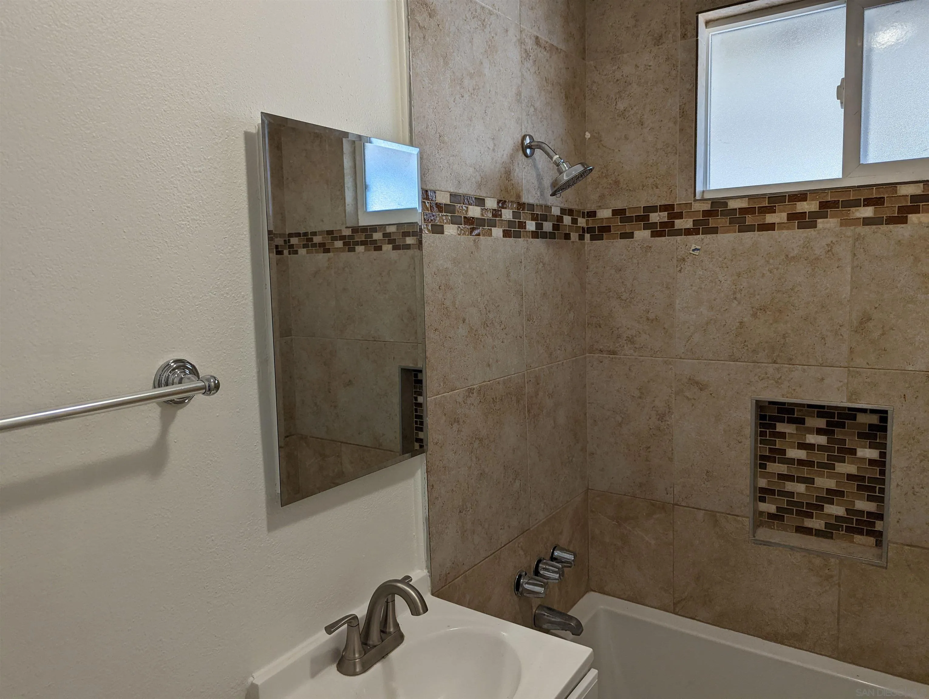 1207-9 Lyons Lane El Cajon, CA 92021 - Photo 17 of 39 a bathroom with a shower and a sink