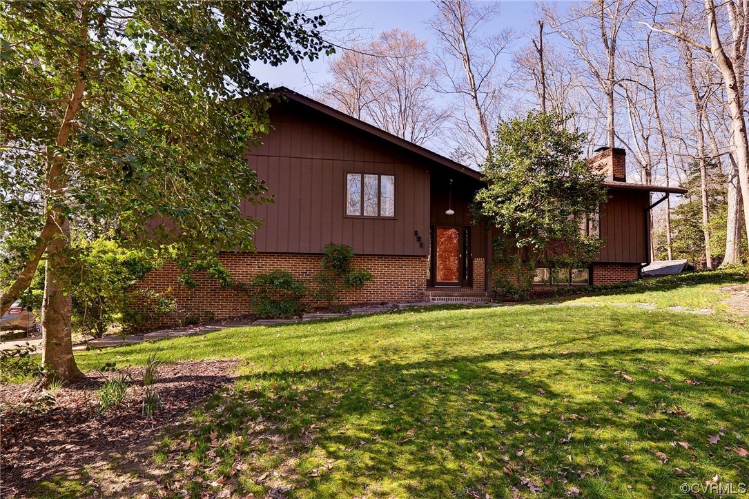 121 Crownpoint Road Williamsburg, VA 23185 - Photo 1 of 10 a view of a house with a yard