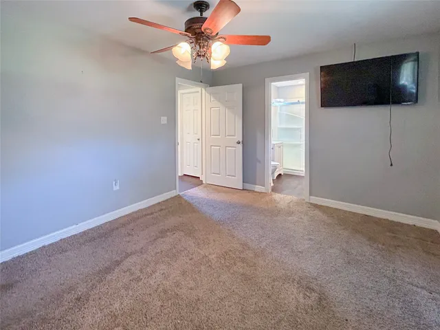 a view of a livingroom with a flat screen tv