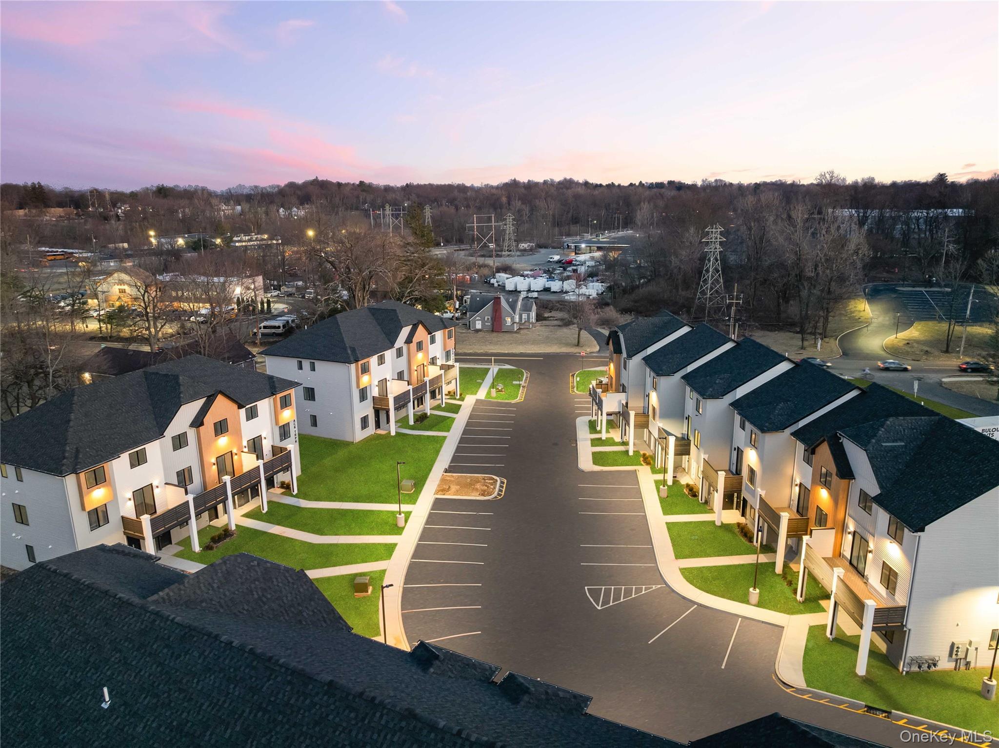 236 Old Nyack Turnpike, Unit 202 Spring Valley, NY 10977 - Photo 47 of 49 an aerial view of a house with a swimming pool
