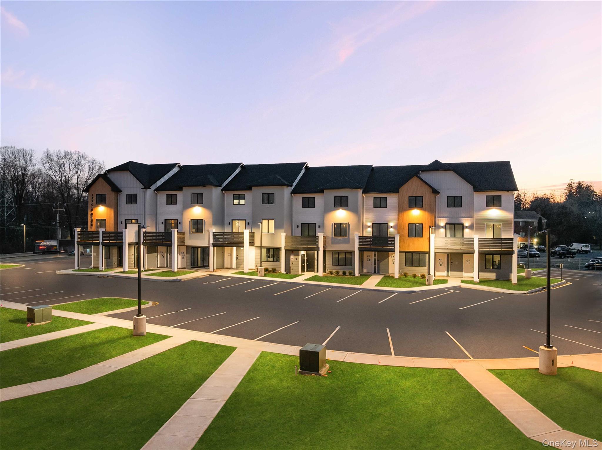 236 Old Nyack Turnpike, Unit 202 Spring Valley, NY 10977 - Photo 48 of 49 a view of multiple houses with yard