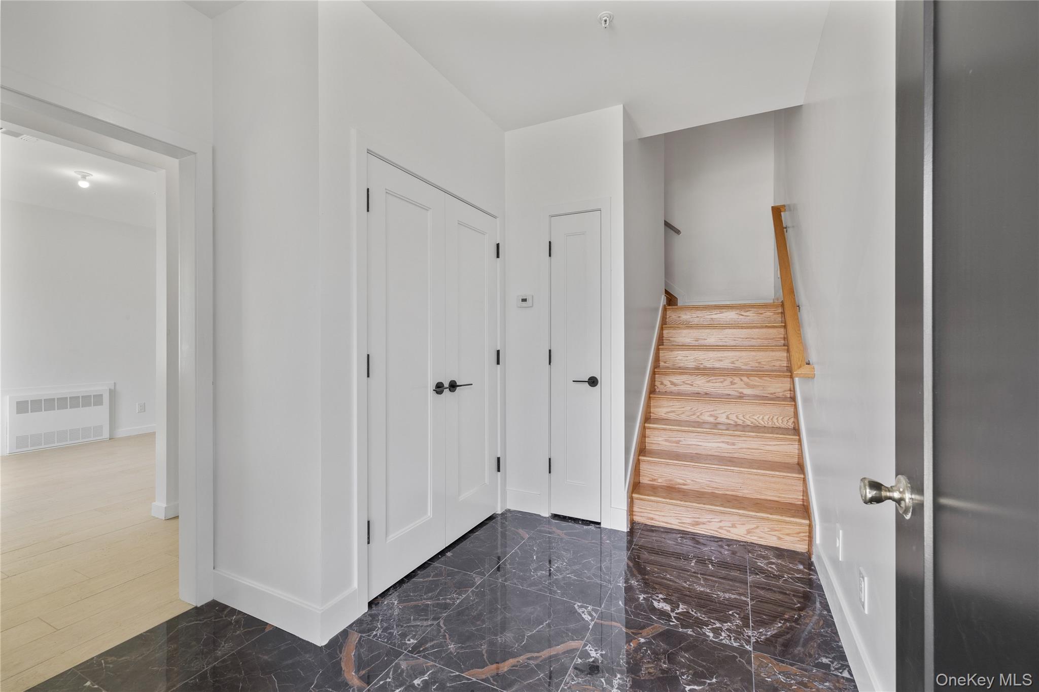 236 Old Nyack Turnpike, Unit 202 Spring Valley, NY 10977 - Photo 5 of 49 a view of a hallway with entryway