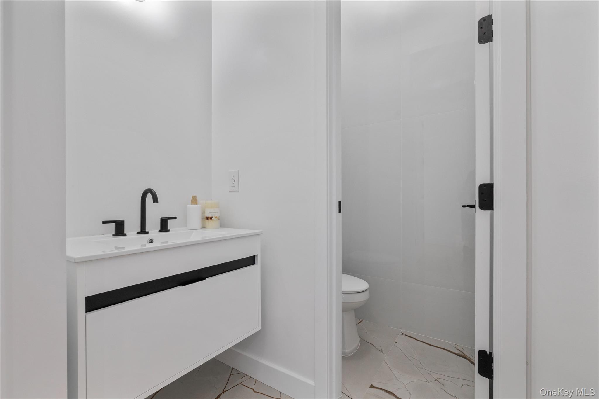 236 Old Nyack Turnpike, Unit 202 Spring Valley, NY 10977 - Photo 9 of 49 a utility room with sink dryer and washer