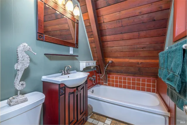a bathroom with a sink and a bathtub