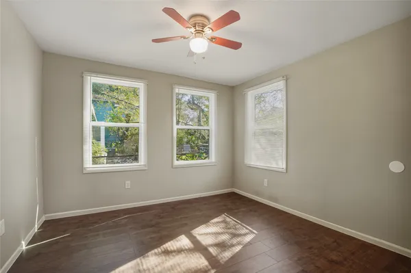 a view of a room that has a window in it