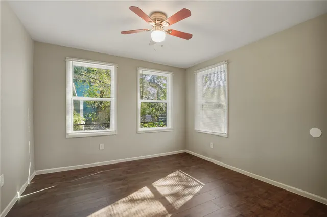 a view of a room that has a window in it