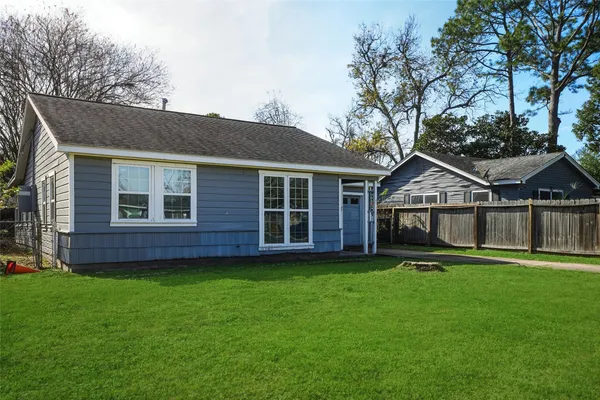 a view of a house with a garden