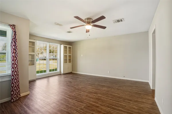 a kitchen with granite countertop cabinets stainless steel appliances and a sink