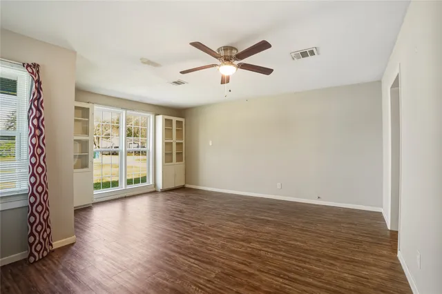 a kitchen with granite countertop cabinets stainless steel appliances and a sink