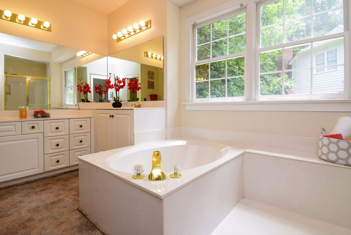 8808 Salute Street Raleigh, NC 27615 - Photo 12 of 25 Spa Bath with Double Vanities and Whirlpool tub and Separate Shower. Master Bath/Spa